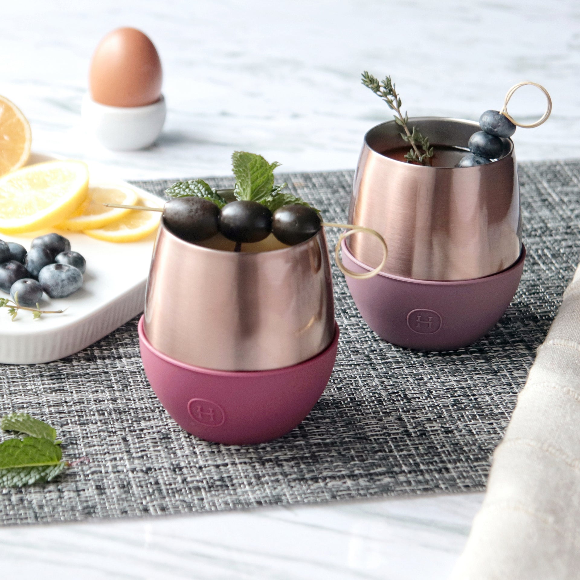 Pink gold HYDY tumbler with sangria design, 8 oz capacity, featuring a sleek, stylish appearance and a smooth finish.