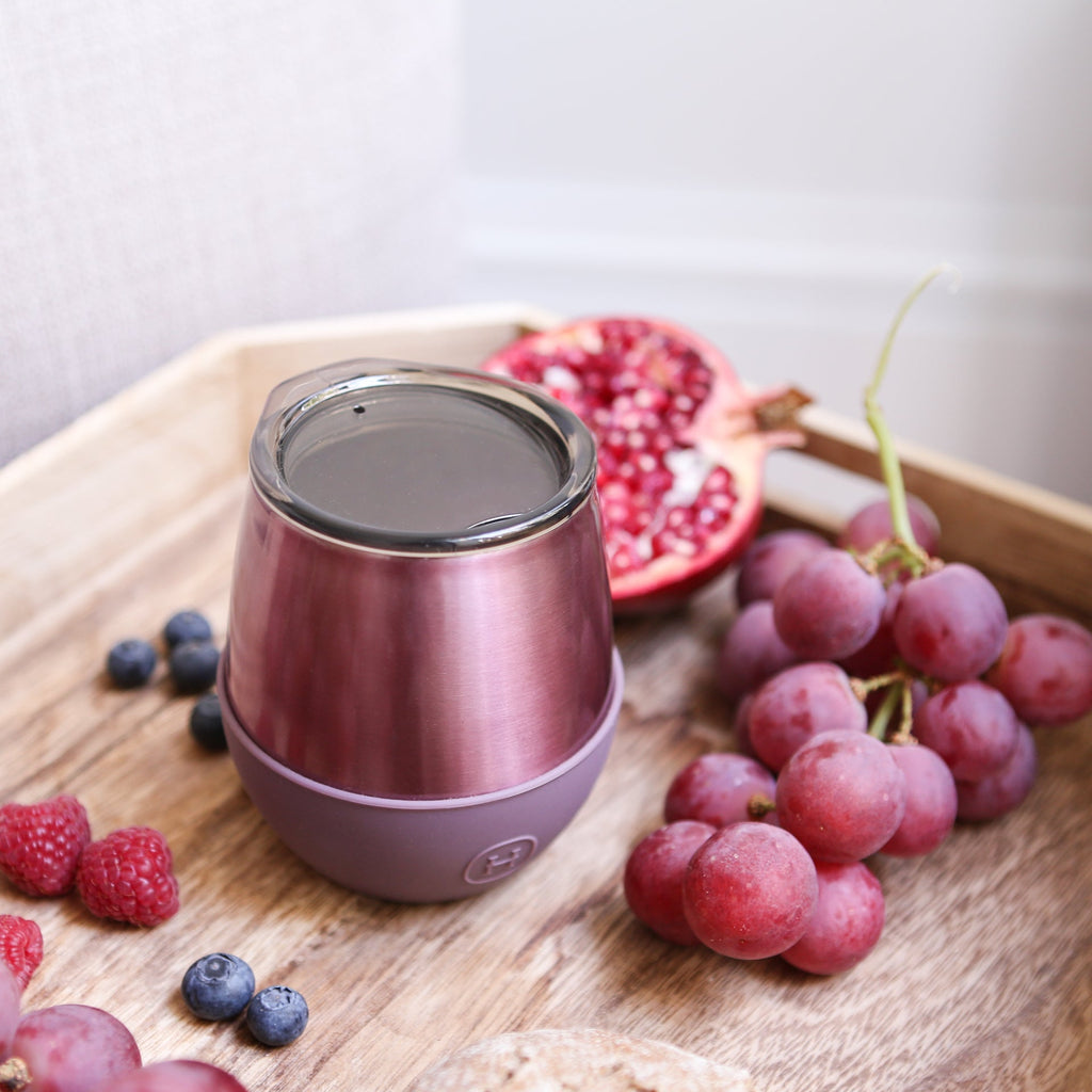 HYDY 8 oz dusty rose rose gold tumbler with a sleek design and stainless steel body, ideal for hot and cold beverages.