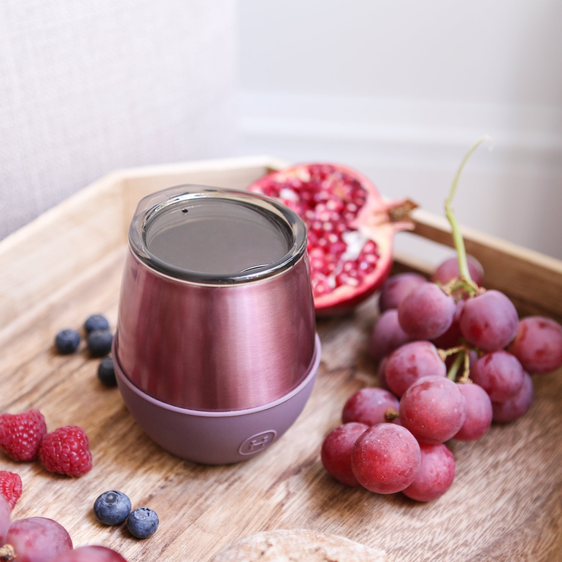 HYDY 8 oz dusty rose rose gold tumbler with a sleek design and stainless steel body, ideal for hot and cold beverages.