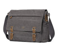 Troop London messenger bag in charcoal with adjustable strap and multiple compartments for laptops and essentials.