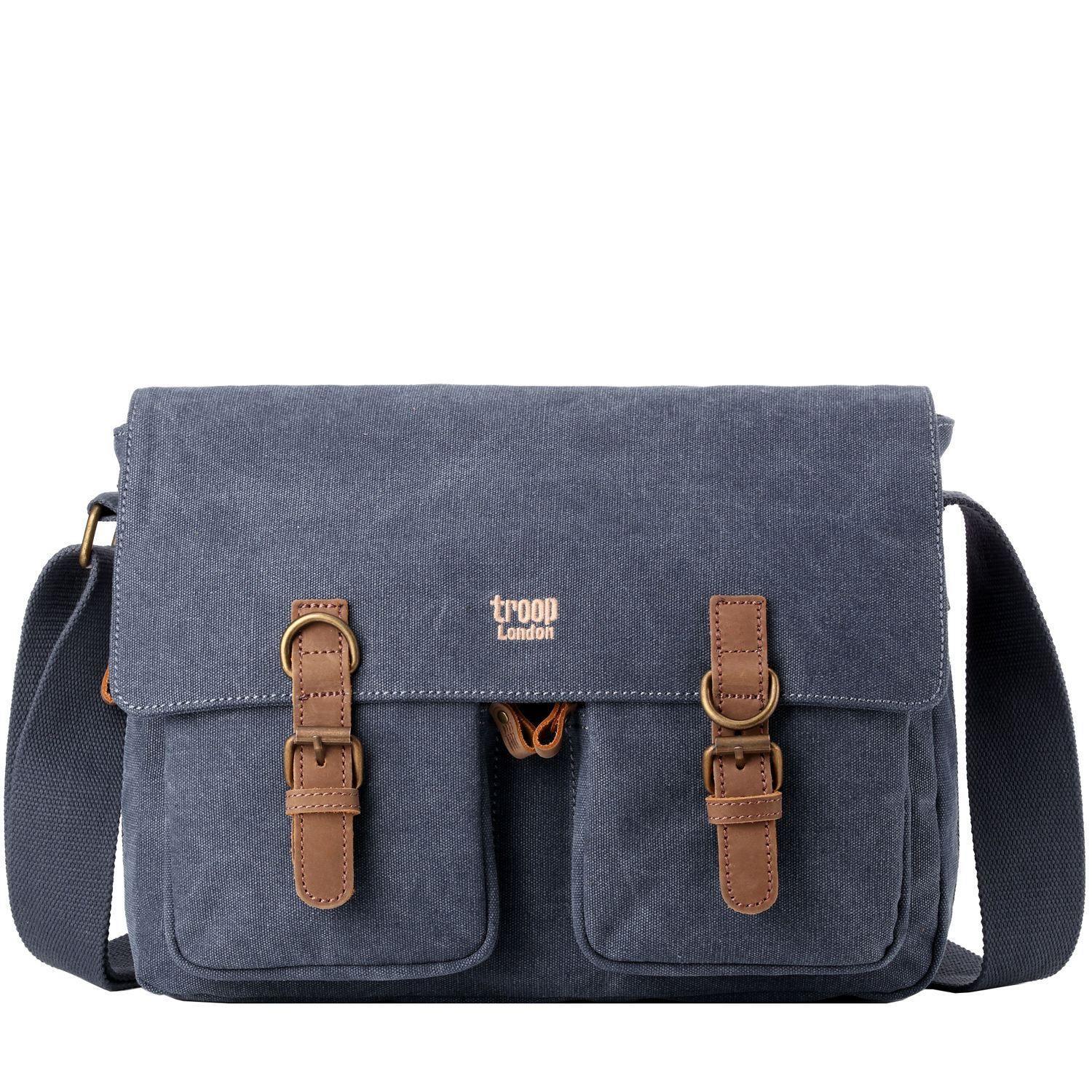 Troop London TRP0210 blue messenger bag with adjustable strap, front pocket, and spacious main compartment.