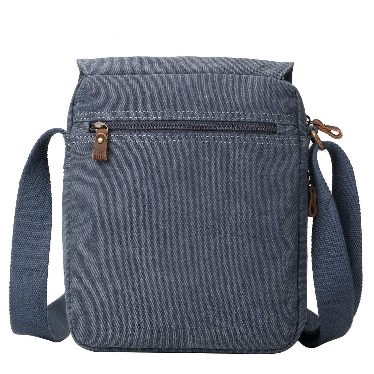 Troop London TRP0211 across body bag with adjustable strap, black durable material, and multiple compartments for everyday use.