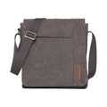 Charcoal Troop London across body bag with adjustable strap and multiple compartments, styled for everyday use.
