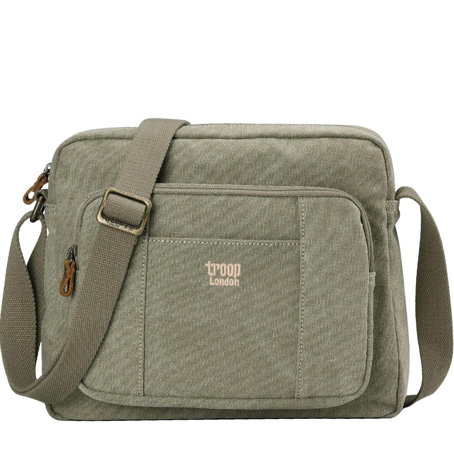 Khaki Troop London across body bag with adjustable strap and front pocket, shown from the front view.