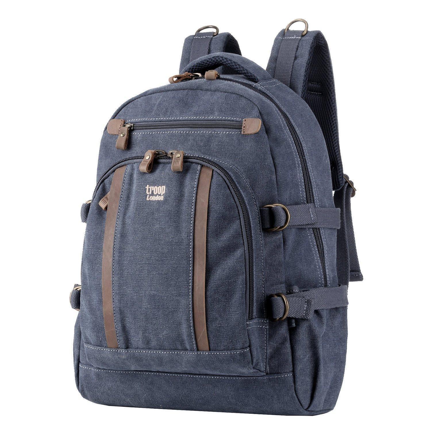 Large blue Troop London laptop backpack with multiple compartments and padded straps for comfortable carrying.