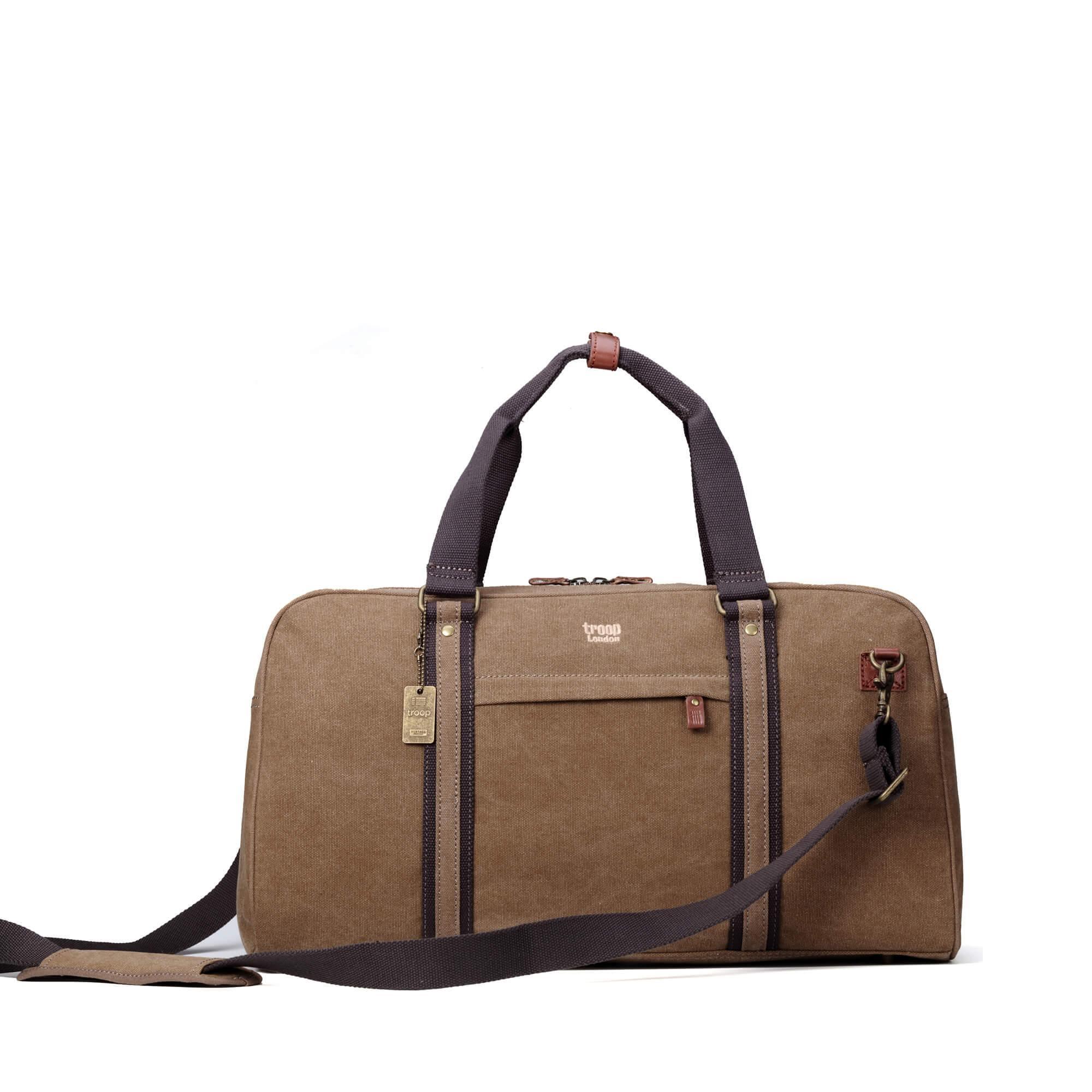 Brown Troop London travel duffel bag with sturdy handles and spacious main compartment, ideal for weekend trips.
