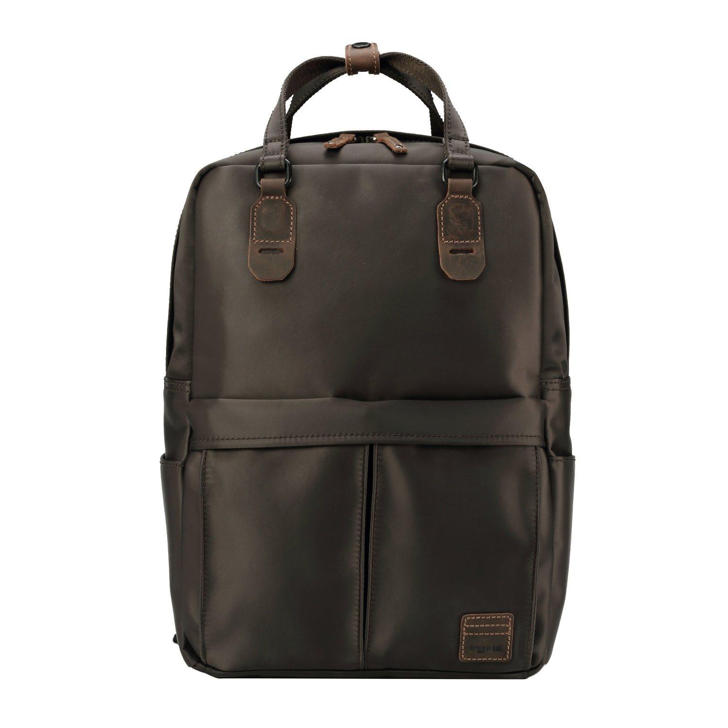 Dark brown Troop London Heritage nylon backpack with dual top snap handles and a spacious main compartment.