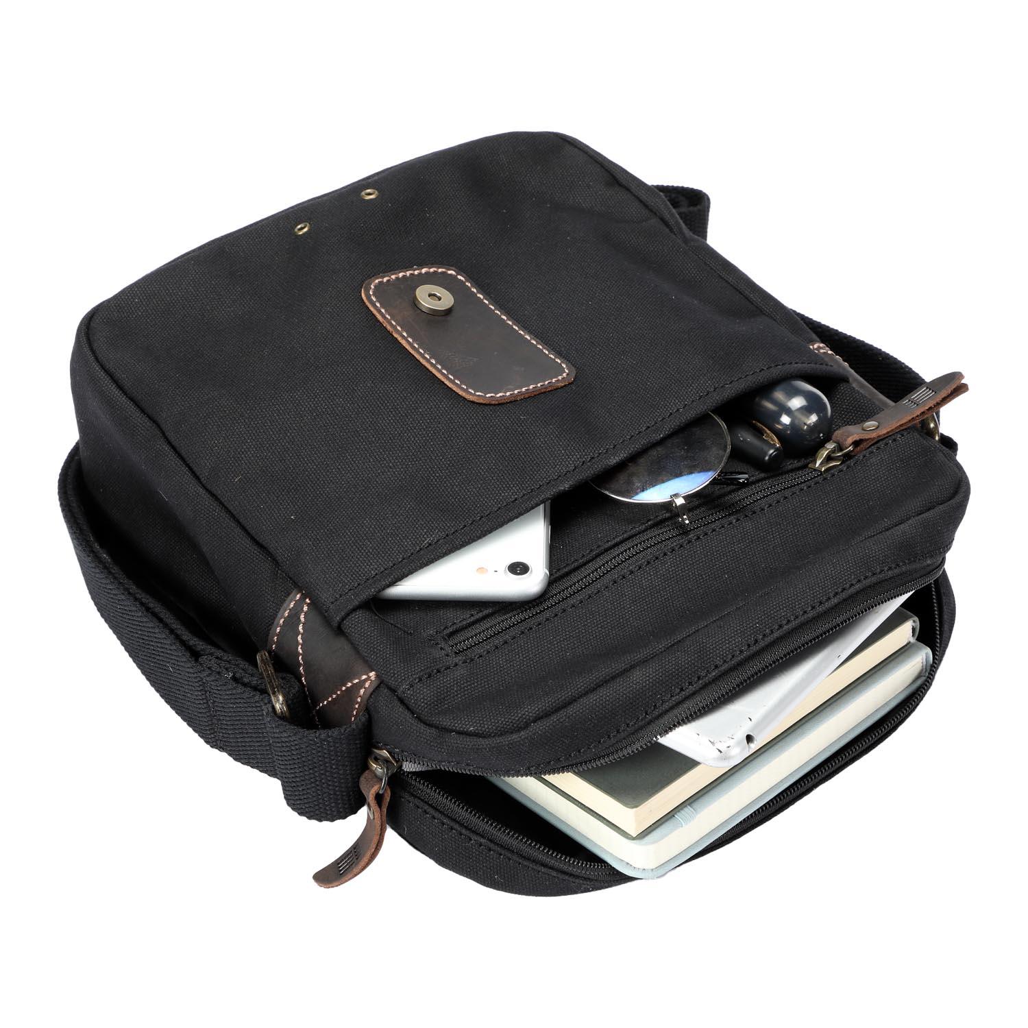 Black Troop London Heritage Across Body Bag with adjustable strap and multiple compartments, stylish and functional for everyday use.