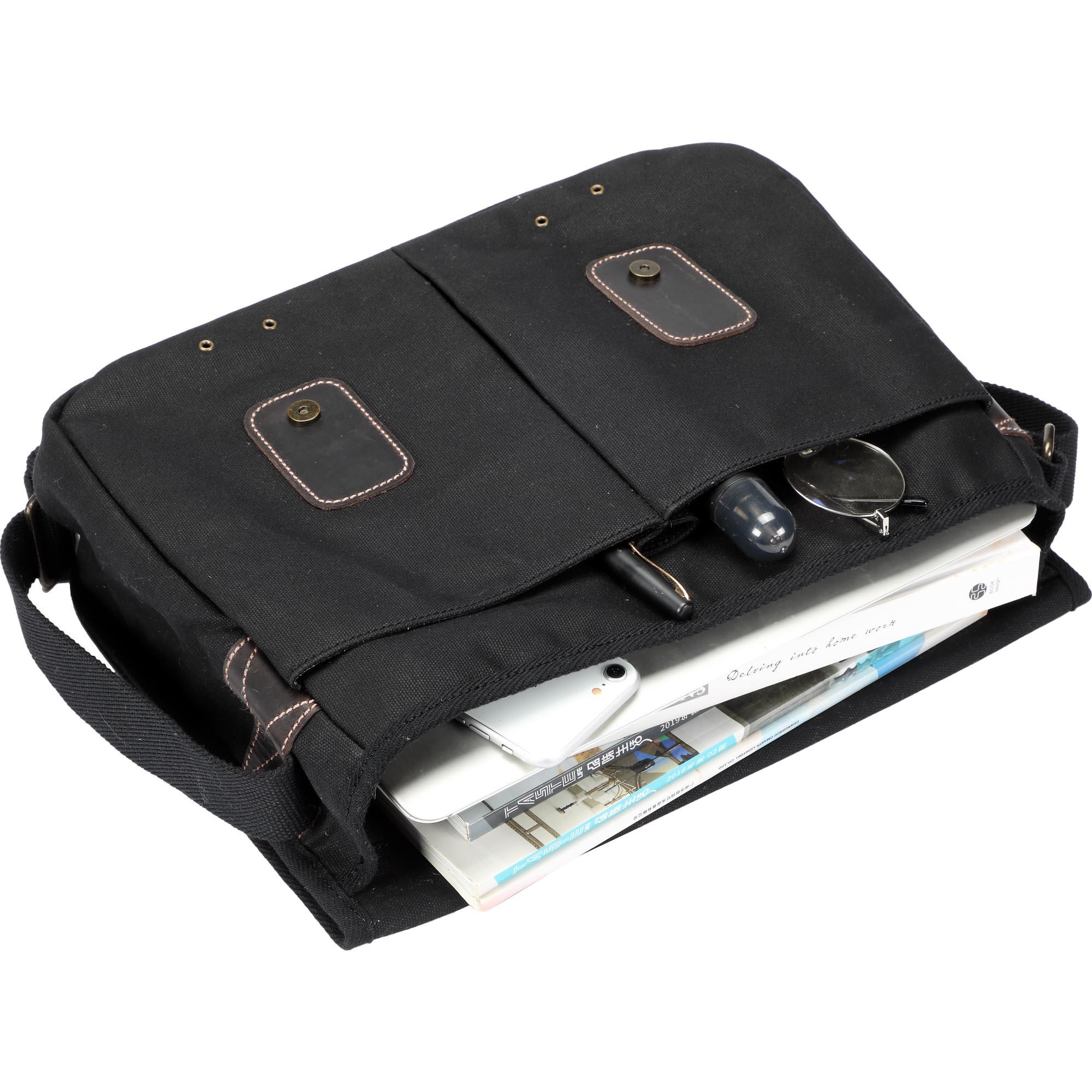 Black Troop London Heritage Messenger Bag with adjustable strap and multiple compartments for laptops and essentials.