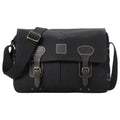 Black Troop London Heritage Messenger Bag with adjustable strap and leather accents, designed for stylish, functional laptop carrying.