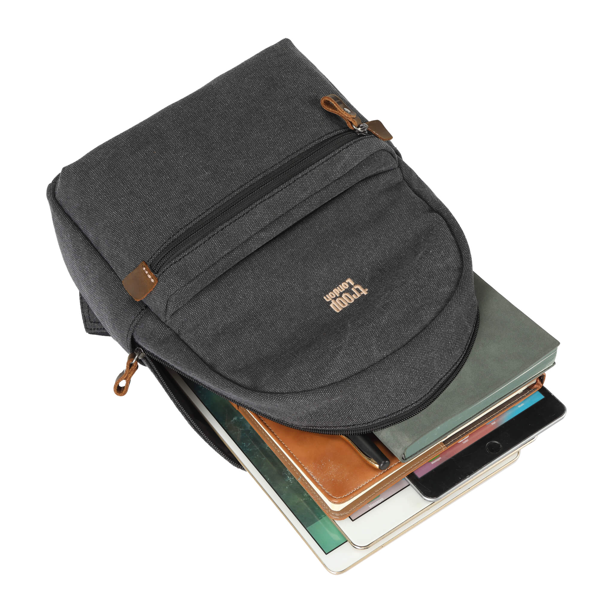 Small Troop London backpack in black stone wash fabric, featuring a compact design with adjustable straps and front pocket.