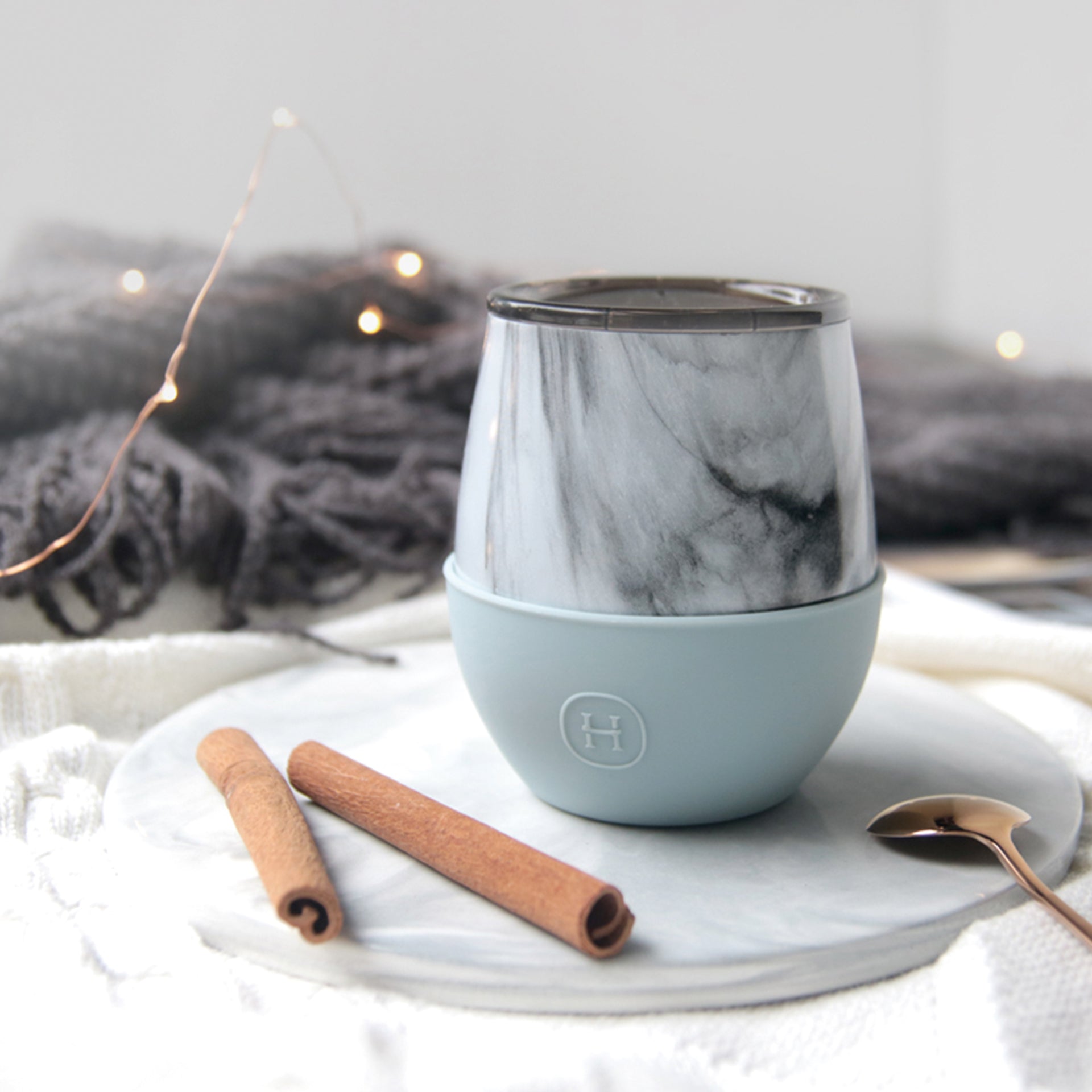 White marble HYDY Cumulus 8 oz tumbler with sleek design and white marble finish, ideal for beverages and on-the-go use.