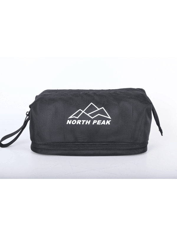 North Peak Hike Small Items Bag showing compact black bag with adjustable straps and multiple compartments for outdoor essentials.