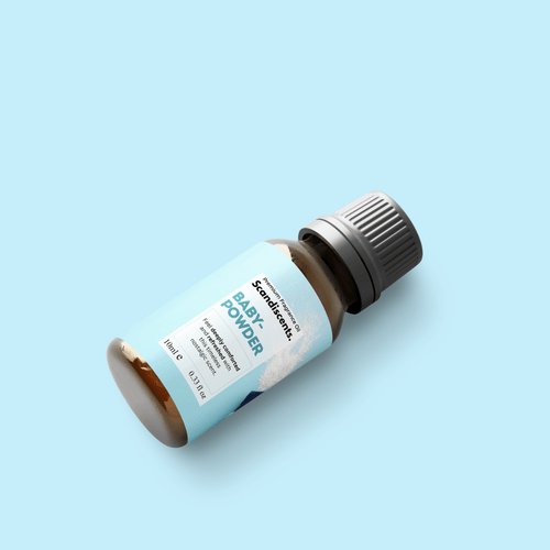 Scandiscents baby powder fragrance oil bottle with a white cap and label, designed for soothing, baby scent aroma.