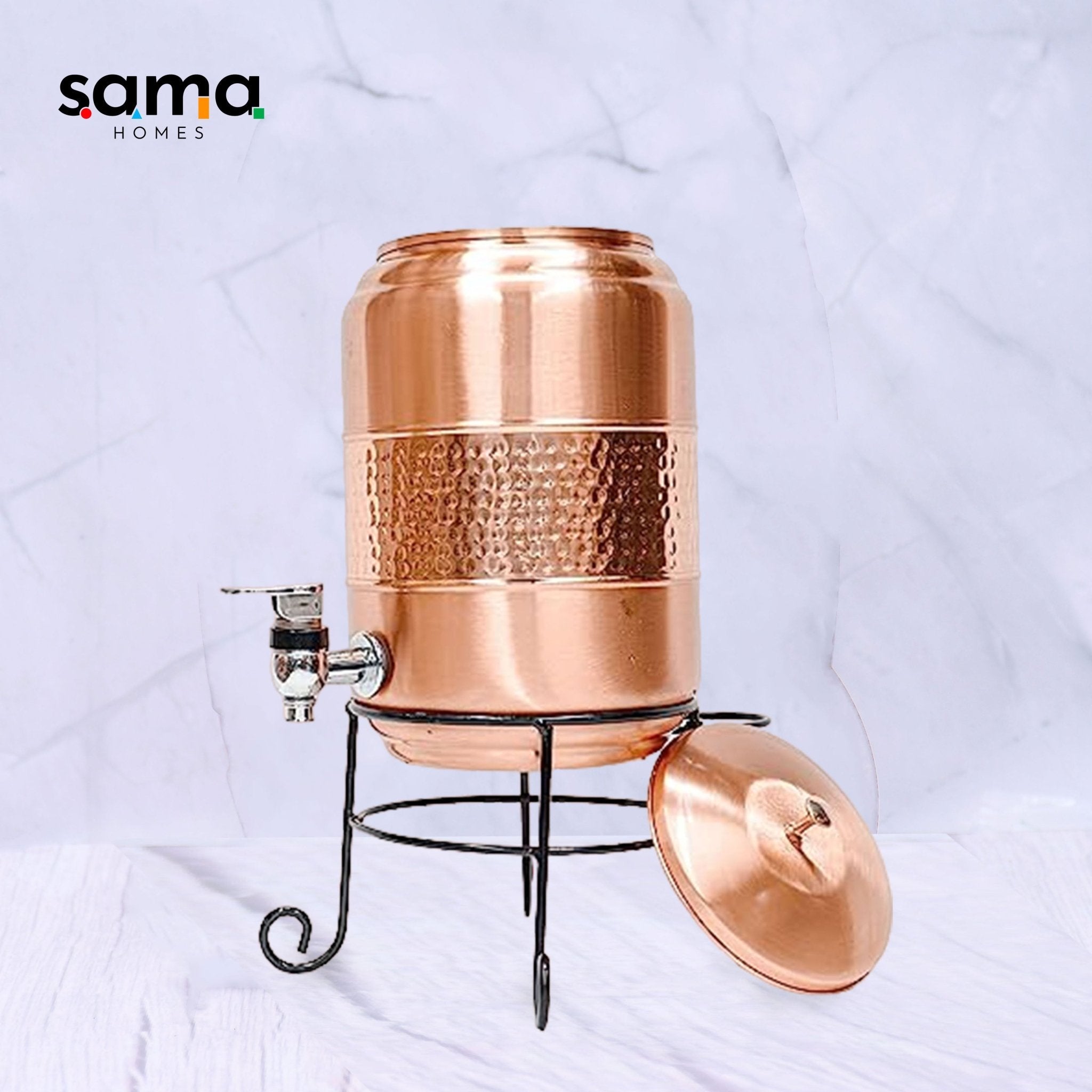 Pure copper half hammered water dispenser with glass and stand, 5000ml capacity, by SAMA Homes, showcasing the textured copper surface.