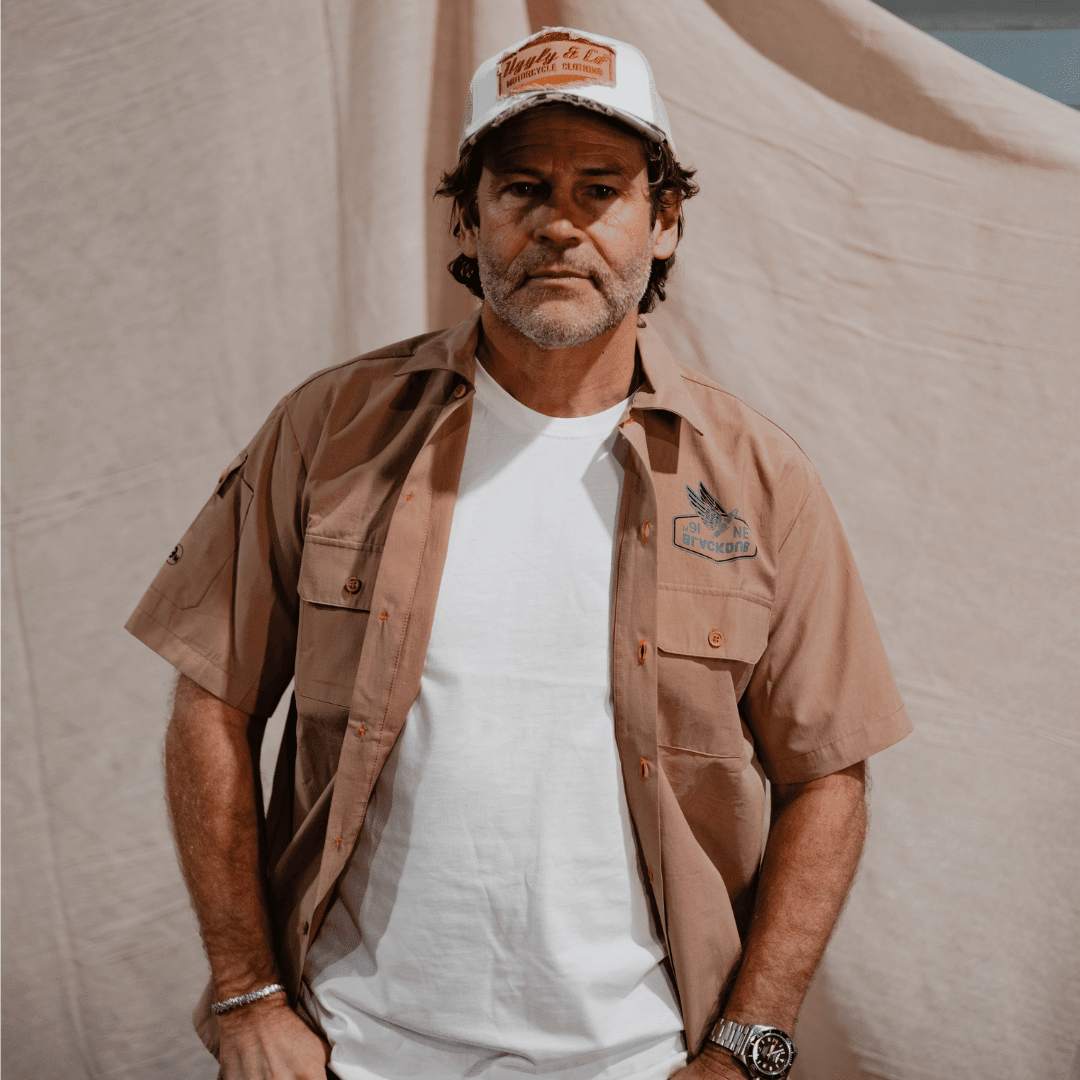 Vintage camo diamond trucker hat by Uggly and Co featuring a classic trucker cap design with mesh back and adjustable strap.