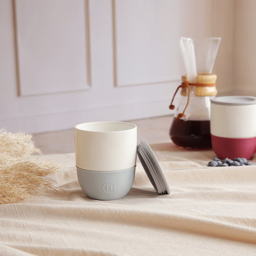 HYDY Cumulus ceramic tumbler mug with 10 fl oz capacity, featuring a soft cloud design and a sleek, modern look.