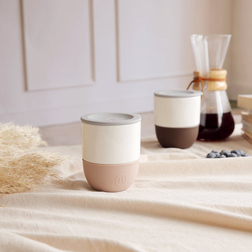 HYDY ceramic latte tumbler mug, 10 fl oz, with a smooth white finish and ergonomic handle, ideal for hot beverages.