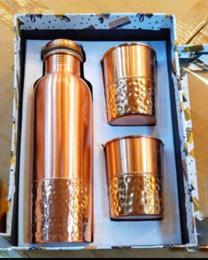 Pure copper water bottle and glass set by SAMA Homes, ideal for Ayurvedic wellness and corporate gift purposes.