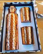 Pure copper water bottle and glass gift set by SAMA Homes, ideal for Ayurvedic wellness and corporate gifting.