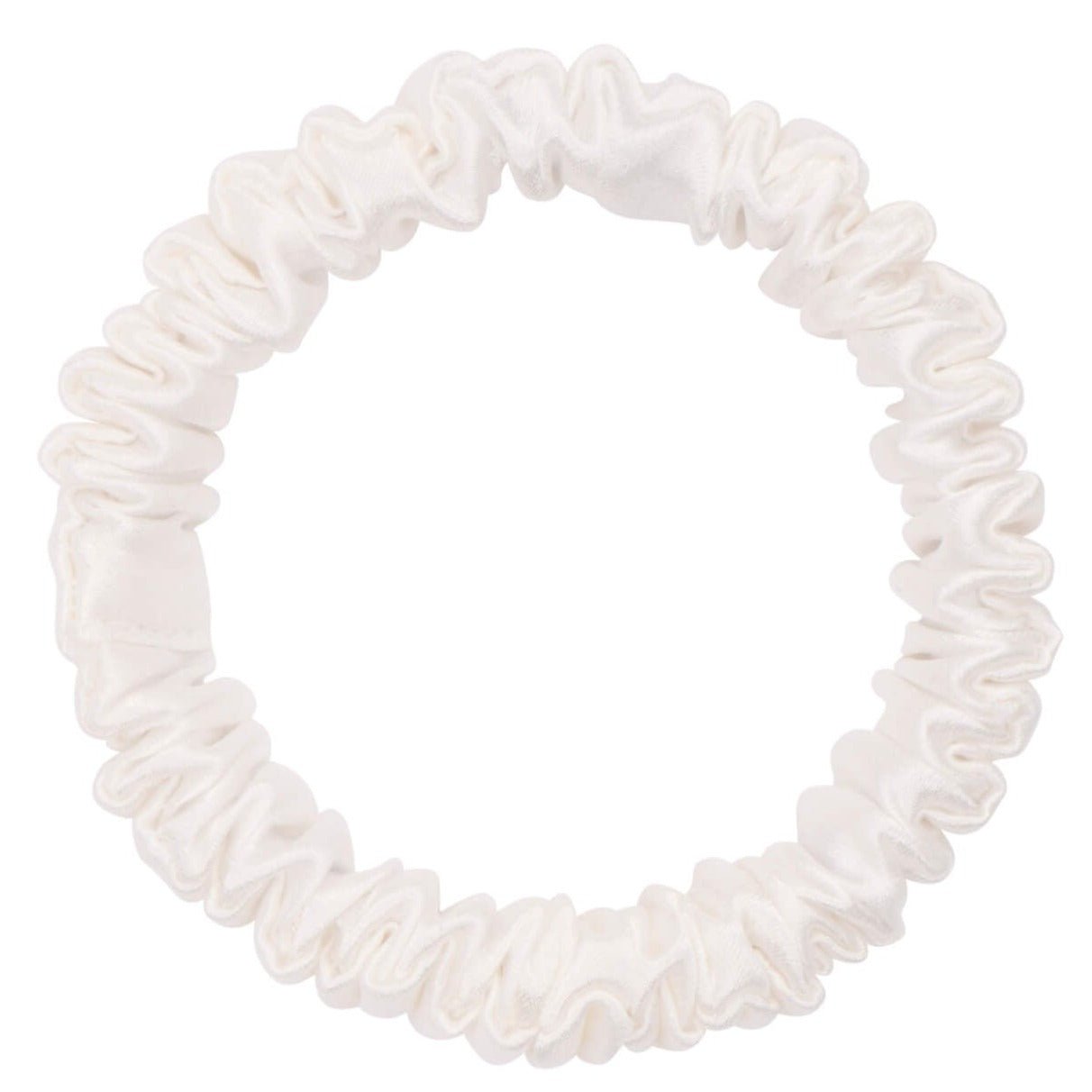 White silk scrunchie by DREAMSILK, skinny style, soft and smooth fabric perfect for gentle hair styling.
