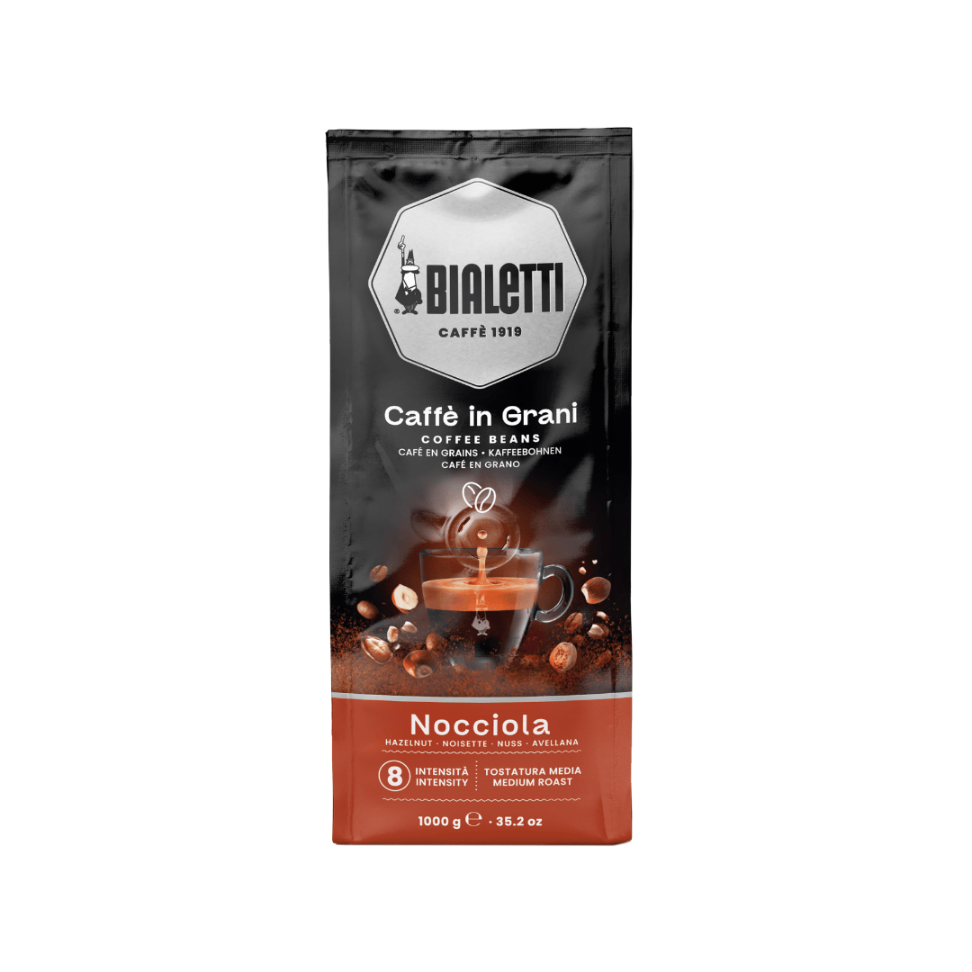 Bialetti Brew Italia whole bean hazelnut coffee in 1kg bag, showcasing fresh coffee beans with a rich aroma.