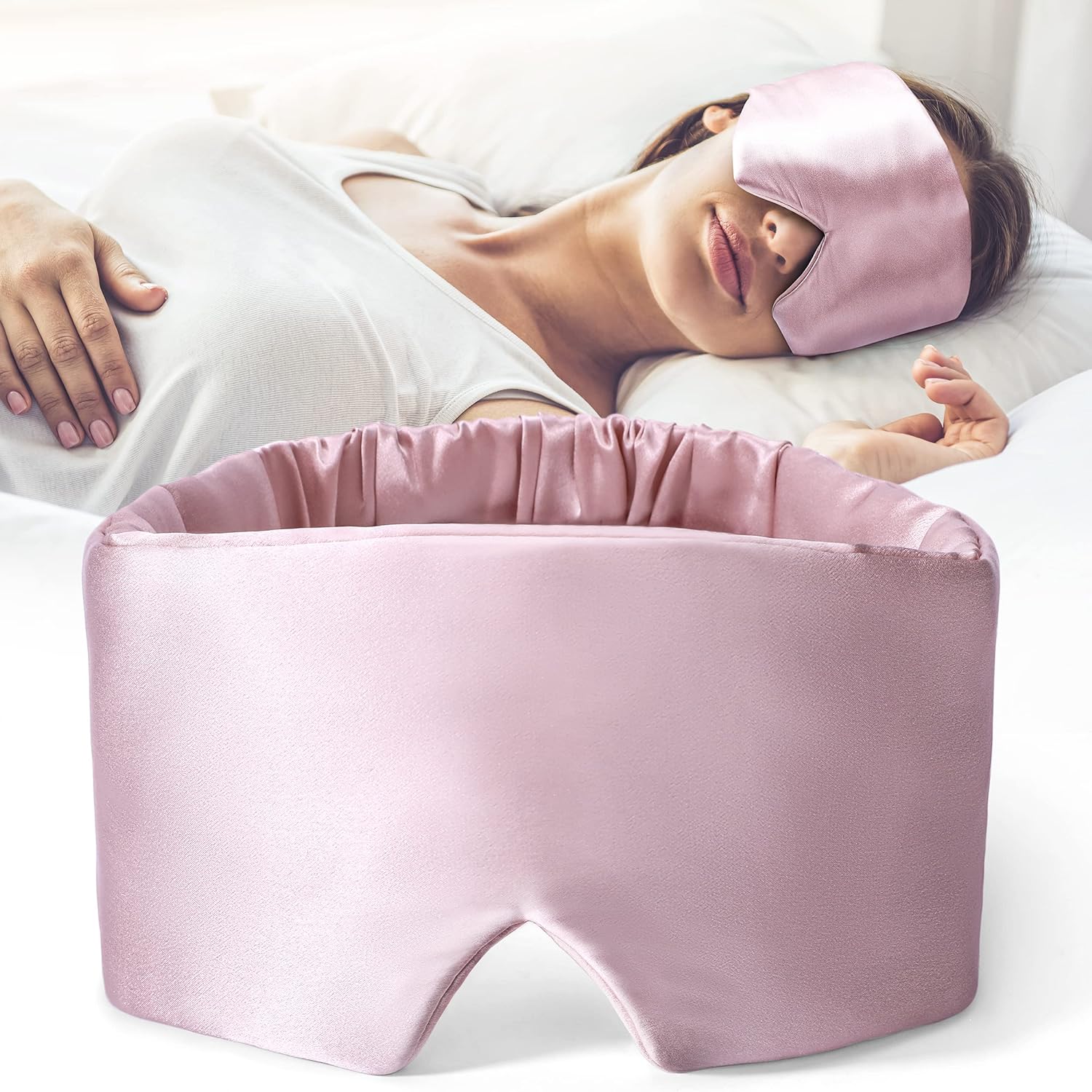 Black DREAMSILK silk sleep mask with soft, smooth fabric designed to block light and promote restful sleep.