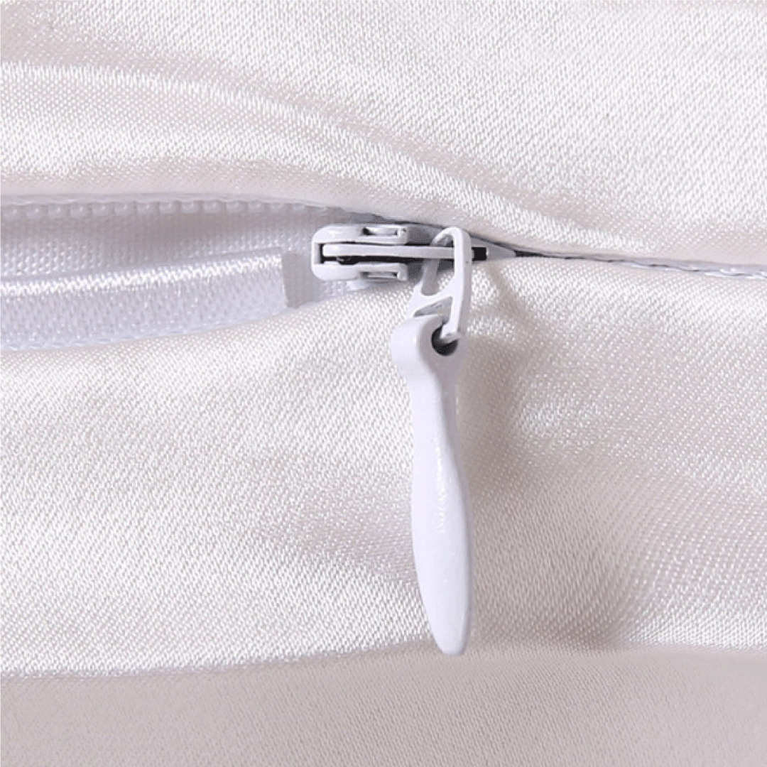 White silk pillowcase from DREAMSILK, standard size, smooth and luxurious fabric perfect for comfortable sleep.