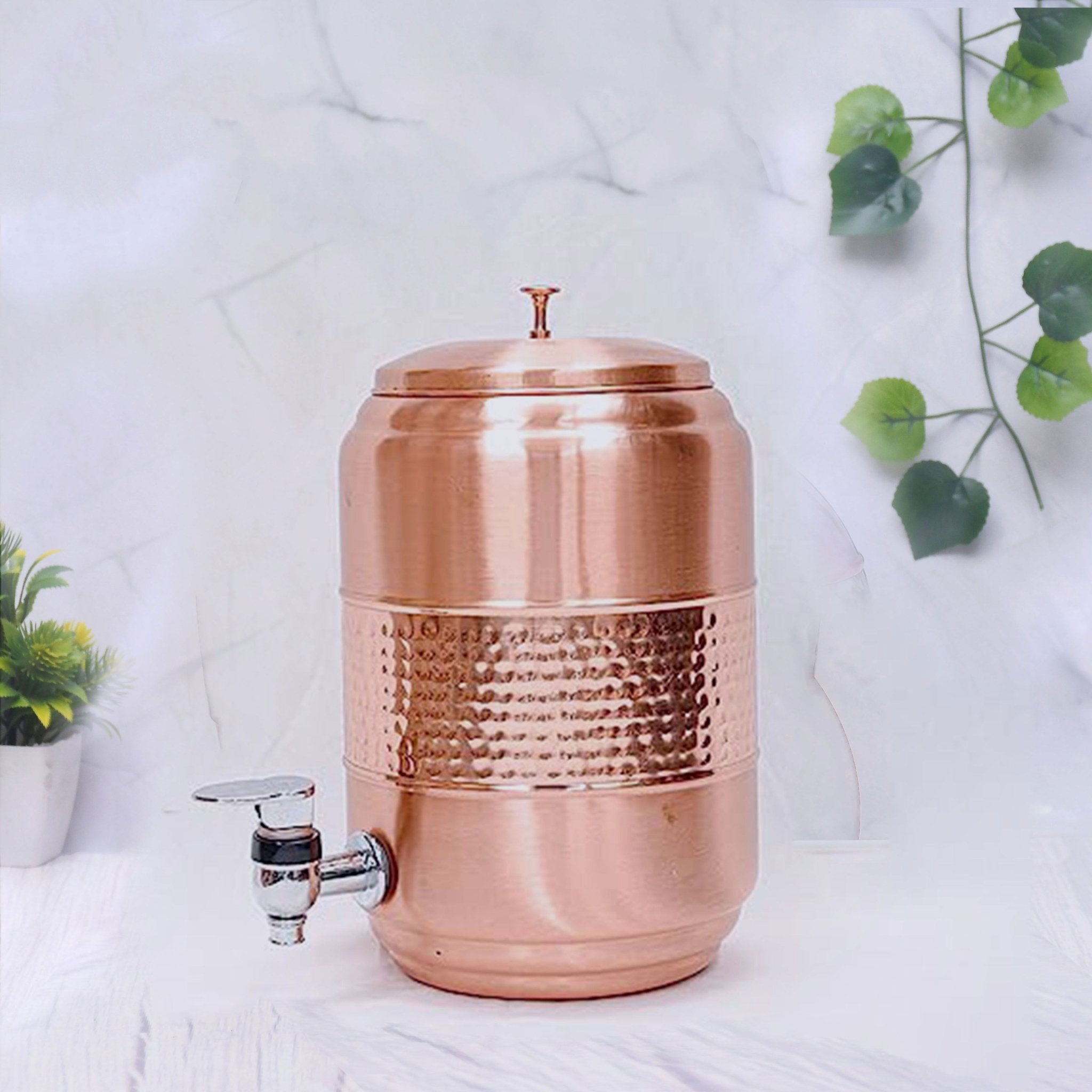 Half hammered pure copper water dispenser with 5-liter capacity, crafted by SAMA Homes for traditional style and durability.