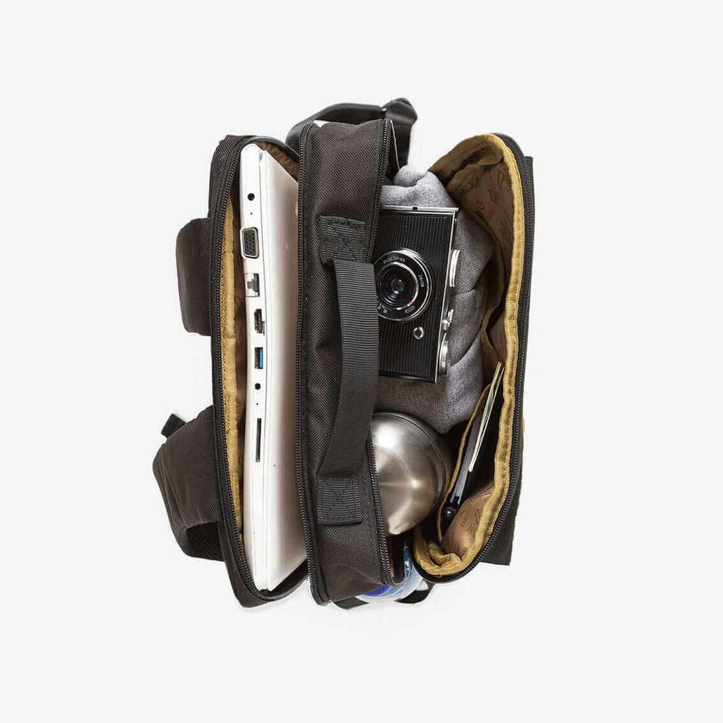 DRiiBE CITYC 2-in-1 travel backpack showing interior compartments with multiple pockets and adjustable straps for versatile use.