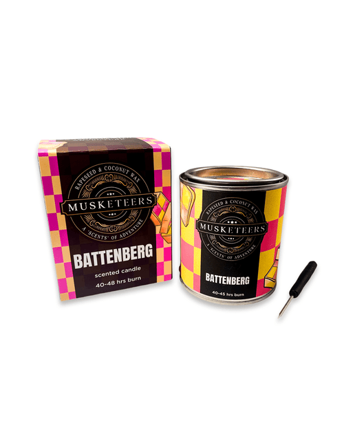 Musketeers Battenberg scented candle with sweet almond cake fragrance, beige candle in a decorative candle jar.