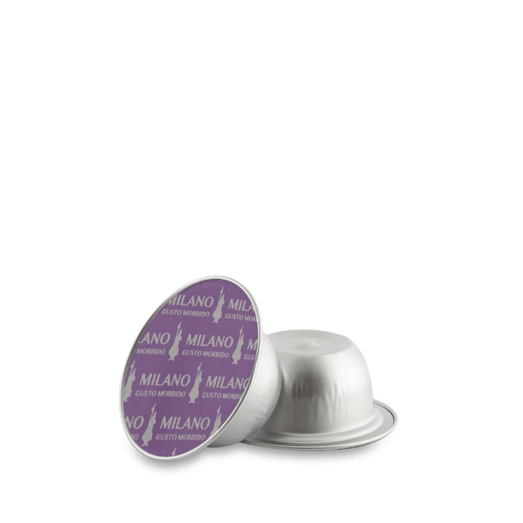 Bialetti Caffe’ d’Italia Brew Italia coffee capsules for Gioia espresso machine, shown in a row with colorful packaging.