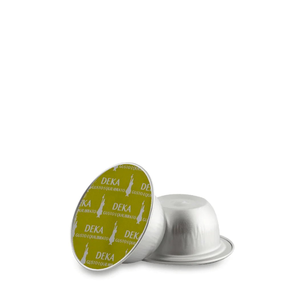 Bialetti Caffe’ d’Italia Coffee Capsules by Brew Italia, Gioia compatible, showing a row of dark roasted coffee capsules.
