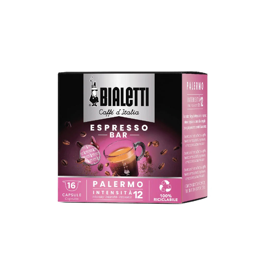 Bialetti Caffe’ d’Italia coffee capsules by Brew Italia, Gioia compatible, shown in a row with colorful packaging and capsules.