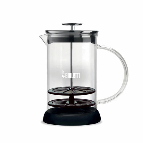 Bialetti Tuttocrema glass milk frother for creating frothy milk for coffee, with a clear glass body and stainless steel handle.