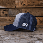 Navy blue and white diamond pattern trucker cap by Uggly and Co with mesh back and curved brim.