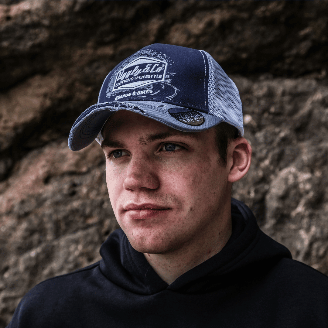 Blue surf diamond trucker cap by Uggly and Co featuring a classic mesh back and stylish diamond design.