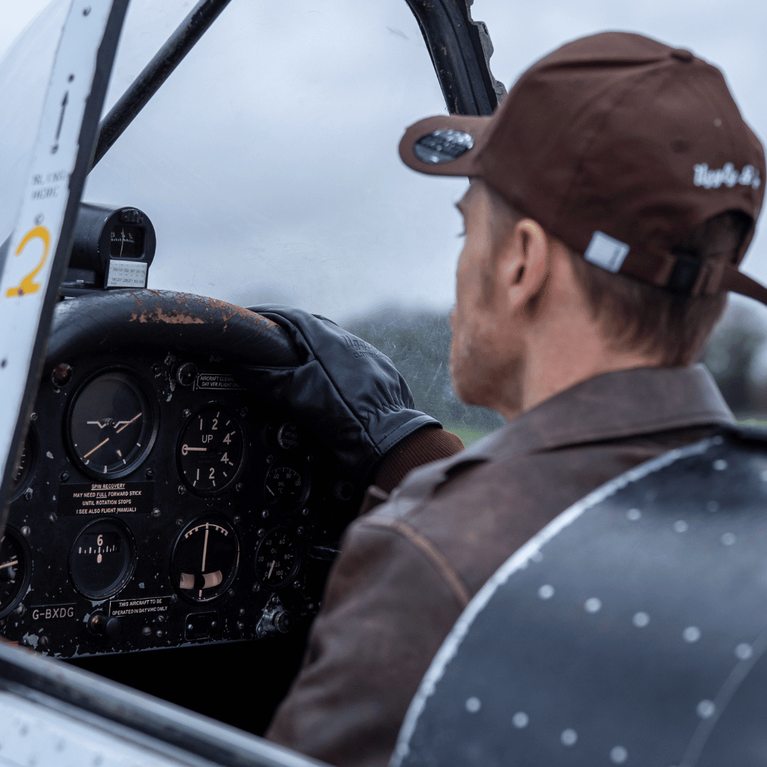 Brown Uggly and Co Aviation diamond trucker hat featuring a baseball cap design and streetwear style for men.