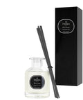 Parks Candles grapefruit and tangerine reed diffuser in a 100ml glass bottle with reed sticks, fresh citrus scent.