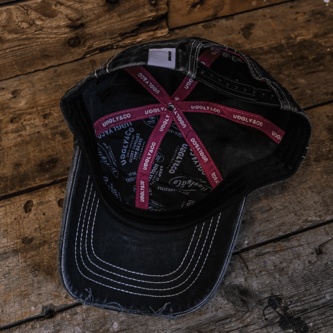 Uggly and Co Diamond Trucker Hat featuring Bradley Ray #28 logo, black mesh back, and adjustable snap closure.