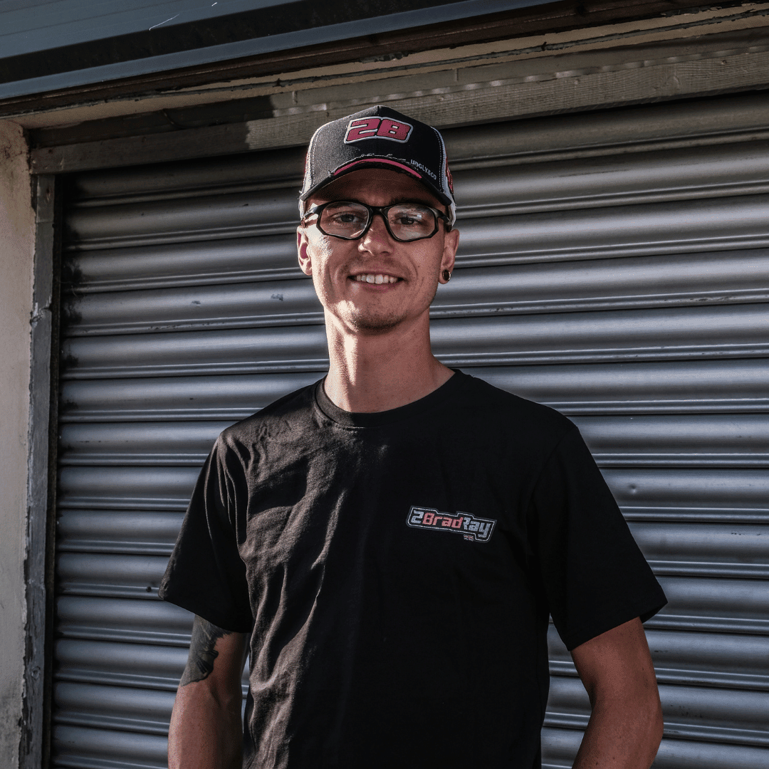 Uggly and Co Bradley Ray #28 trucker cap with mesh back and embroidered logo, casual style for motorcycle fans.