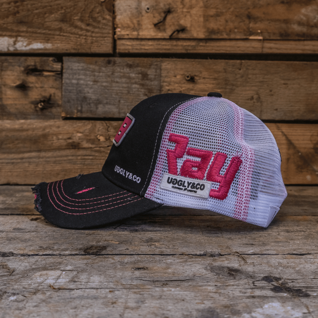 Uggly and Co Bradley Ray #28 trucker cap with mesh back and branded front panel, casual accessory for outdoor wear.
