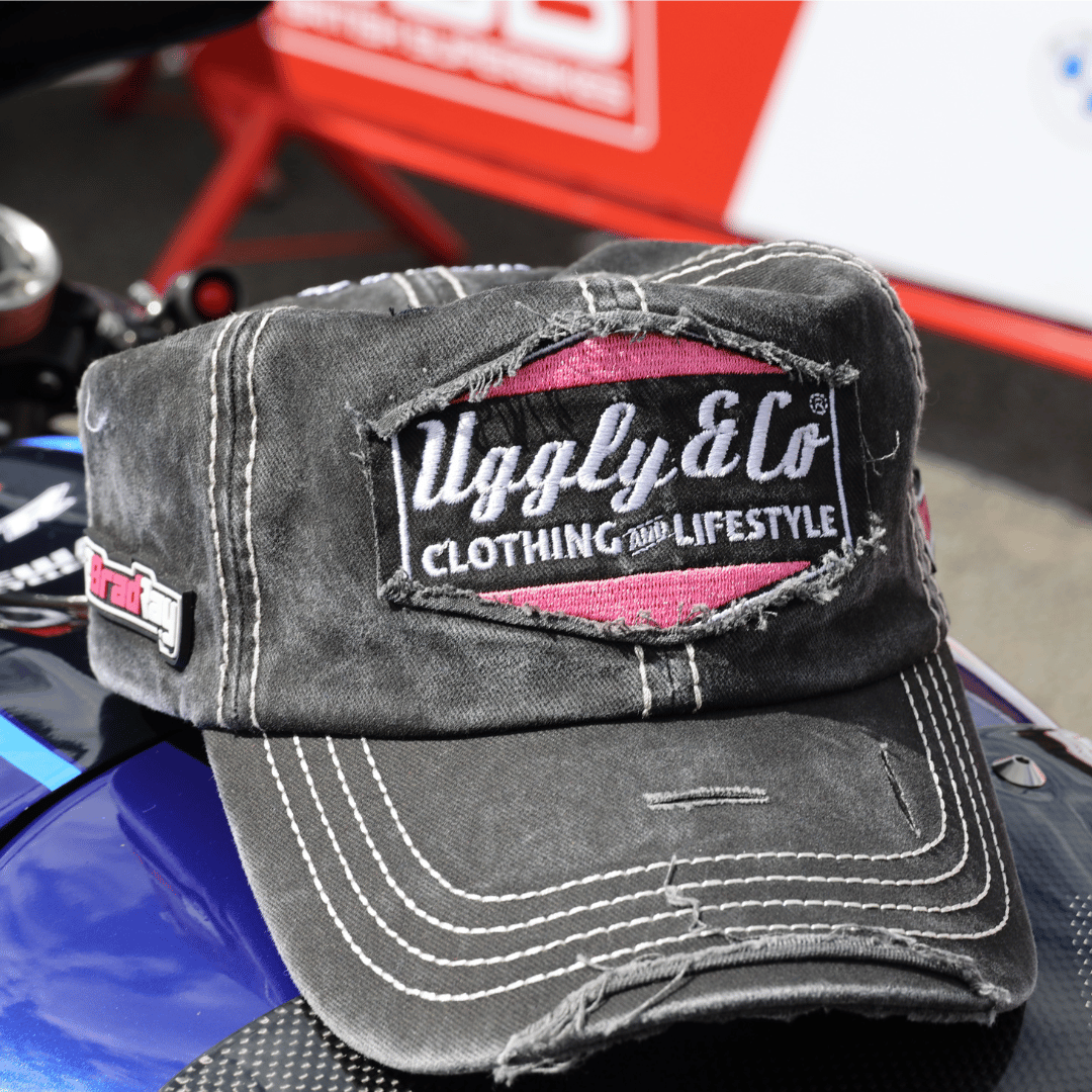 Uggly and Co Diamond Trucker Hat featuring Bradley Ray #28 design, adjustable mesh trucker cap with diamond logo detail.