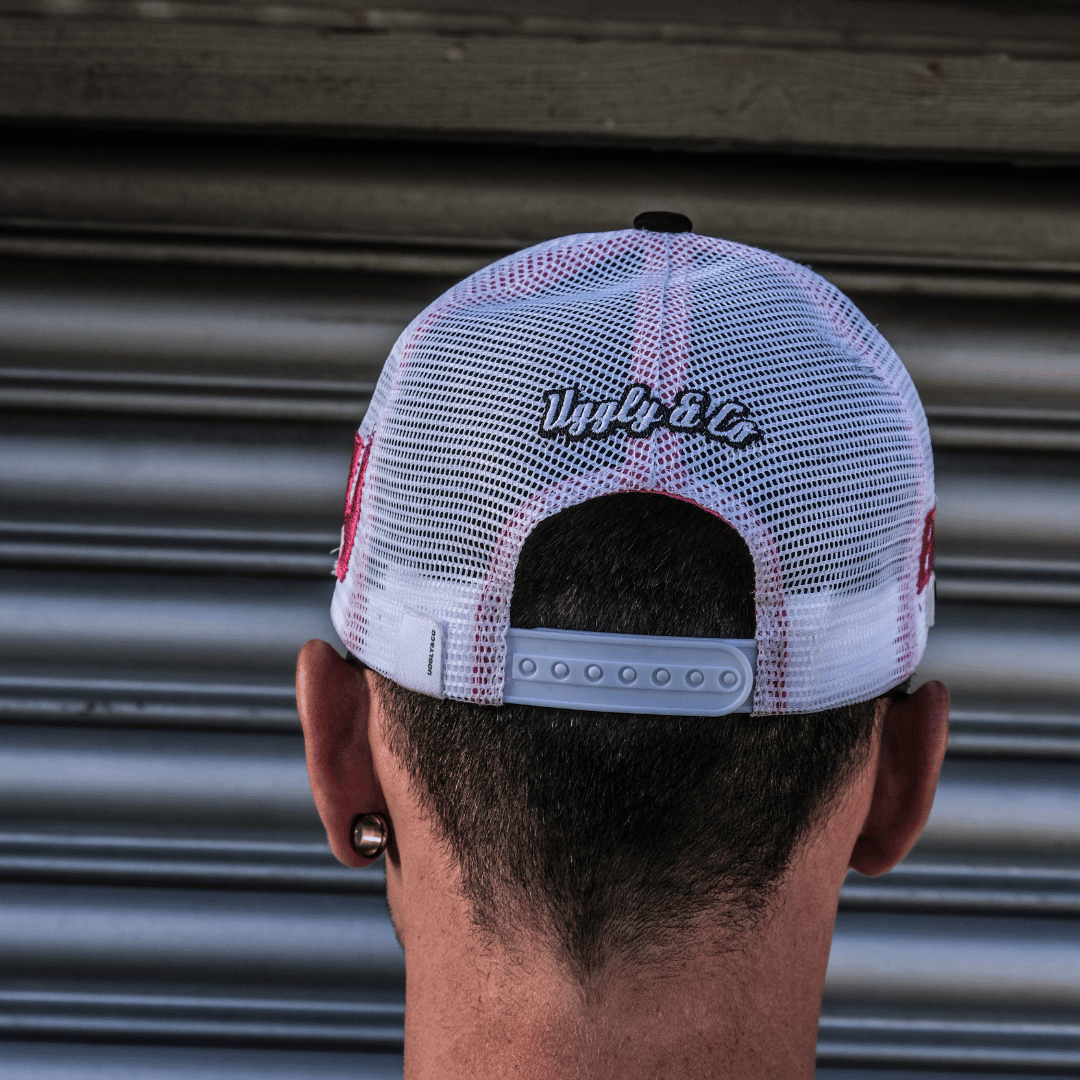 Uggly and Co Bradley Ray #28 trucker cap with mesh back and embroidered front logo, casual headwear for fans and everyday wear.