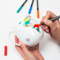 Set of four Trouvaille ceramic pens with colorful ink, ideal for coloring or decorating ceramic mugs and other surfaces.