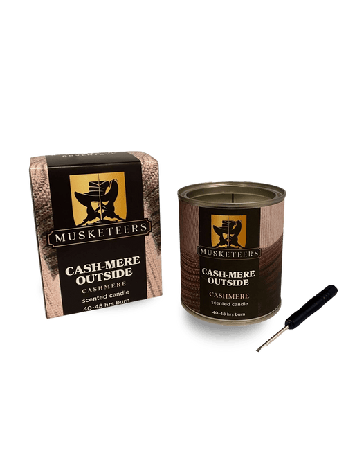 Luxurious cashmere-scented candle by Musketeers, showcasing a elegant candle with a soft, cozy glow and a refined design.