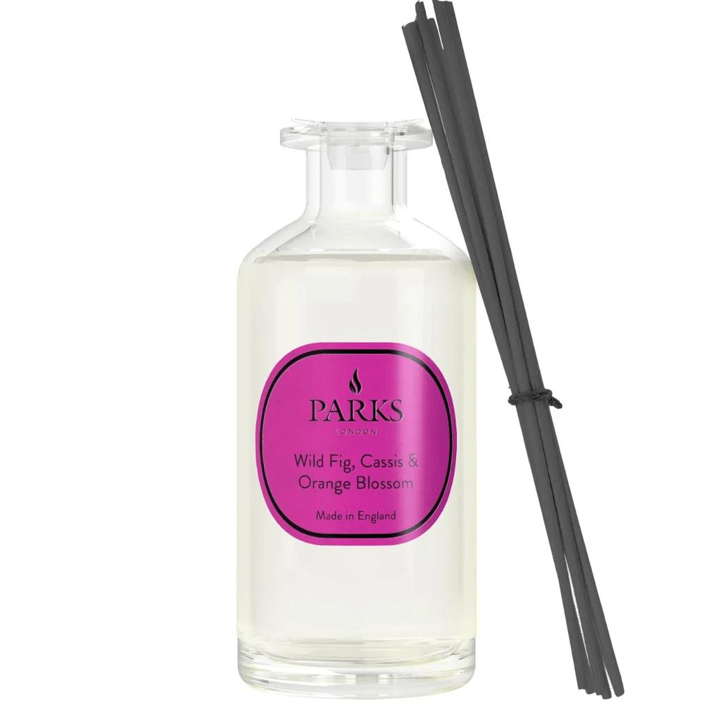 Parks Candles Wild Fig, Cassis & Orange Blossom reed diffuser with 220ml glass bottle and natural reed sticks.