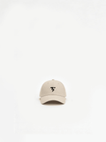 Beige low-profile cap for padel and pickleball by Third Shot UK, casual dad hat style in cream color.