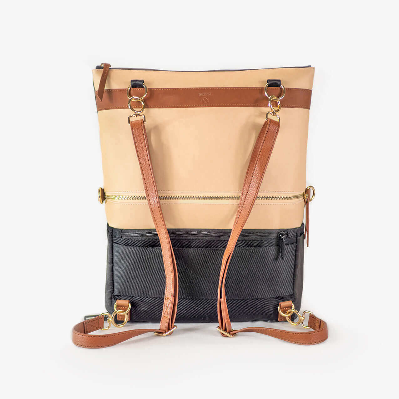 DRiiBE Dakota 3-in-1 convertible backpack purse in sand, showing versatile daypack with adjustable straps and compact design
