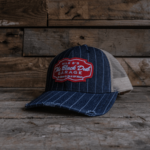 Vintage pinstripe denim trucker cap by Uggly and Co, featuring classic style and adjustable strap, perfect for casual wear.
